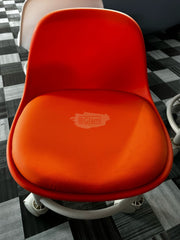 Low Stool with Back Support on Wheels Orange Low Stool