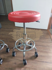 Adjustable Stool on wheels with footrest - Round - Red